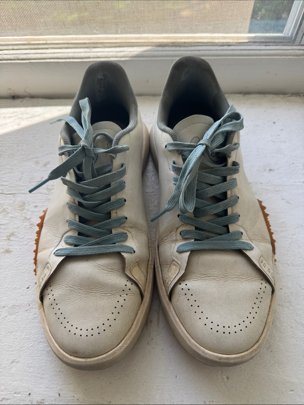 G/FORE Cream Leather Sneakers with Light Blue Laces and Tan Tread